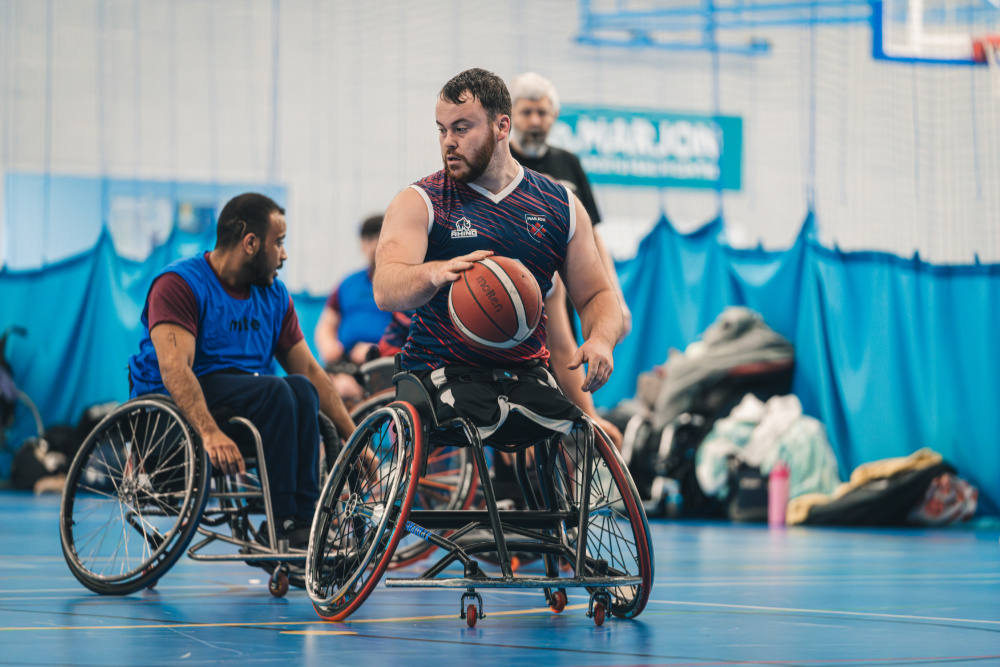 A men's wheelchair basketball game in session